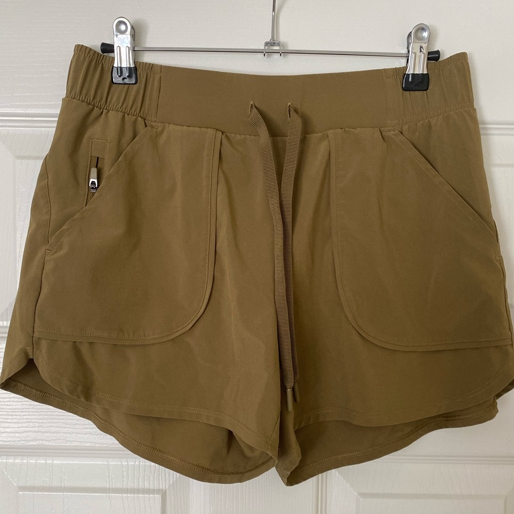 green athletic shorts
